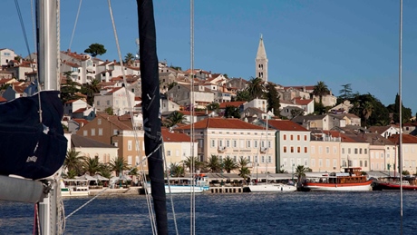 Scenic view of the coastal town Mali Losinj with boats along the waterfront
