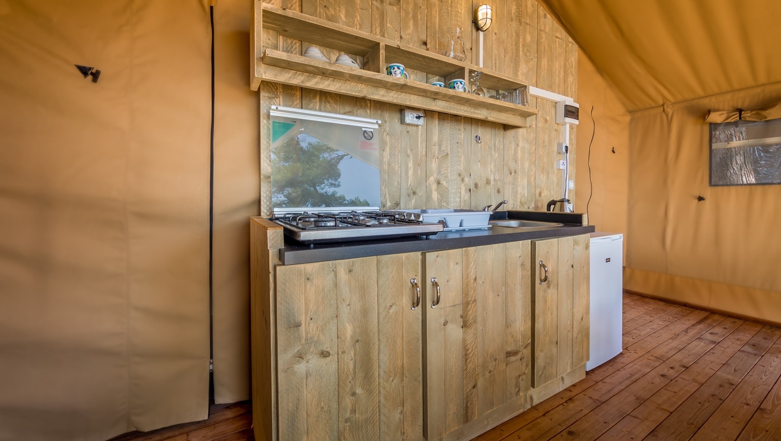 Kitchen area inside a Baldarin glamping tent