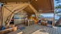 Baldarin glamping tent with wooden interior and ocean view